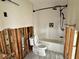 Bathroom with a shower/tub combo and updated bronze-tone hardware needing renovation at 1910 New Hampshire Ne Ave, St Petersburg, FL 33703