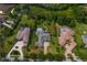 Luxury homes with meticulously manicured lawns, screened pools, and paver driveways at 19815 Sea Rider Way, Lutz, FL 33559
