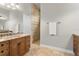 Bathroom with tile flooring, granite counters, and walk-in shower at 19815 Sea Rider Way, Lutz, FL 33559
