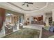Open-concept living area flows seamlessly into the kitchen with breakfast bar and seating at 19815 Sea Rider Way, Lutz, FL 33559