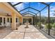 Large covered patio with a fountain, brick floors, and lovely views at 19815 Sea Rider Way, Lutz, FL 33559