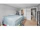 Bedroom showing access to closet and additional room; features neutral wall color and cat tree at 200 Country Club Dr # 403, Largo, FL 33771