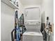 Efficient laundry area features a stacked washer and dryer unit, optimizing space in the home at 200 Country Club Dr # 403, Largo, FL 33771