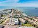 Expansive aerial view of coastal real estate, marinas, and the beautiful blue ocean at 2004 Yale Ave, Dunedin, FL 34698