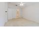 Bedroom with large closet, interior shelving, and access to the bathroom at 24839 Wild Frontier Dr, Land O Lakes, FL 34639