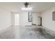 This garage is spacious and well lit with a cement floor and a door to the main house at 24839 Wild Frontier Dr, Land O Lakes, FL 34639