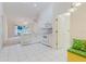 Bright kitchen with white cabinets, modern appliances, and tiled floor at 24839 Wild Frontier Dr, Land O Lakes, FL 34639