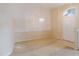 Bright and airy living room with carpet and neutral walls, perfect for relaxation at 24839 Wild Frontier Dr, Land O Lakes, FL 34639