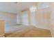 Spacious living room with natural light and neutral tones, awaiting your personal touch at 24839 Wild Frontier Dr, Land O Lakes, FL 34639