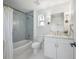 Bathroom featuring bathtub with gray tile, and gold fixtures at 2718 N 21St St, Tampa, FL 33605