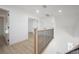 Upstairs hallway featuring railing, and neutral colors at 2718 N 21St St, Tampa, FL 33605