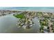 Aerial view of the home's location near the bay, community, and waterways at 300 10Th Ave, Indian Rocks Beach, FL 33785