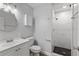 Modern bathroom featuring a walk-in shower, new vanity and a toilet at 314 Barlow Ave # 73, Sarasota, FL 34232
