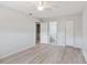 Spacious bedroom featuring new flooring, a ceiling fan and an ensuite bathroom at 314 Barlow Ave # 73, Sarasota, FL 34232