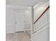 Bright entryway with stairs and new flooring leading to the living area at 314 Barlow Ave # 73, Sarasota, FL 34232