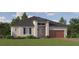 Charming single-story home with a symmetrical facade, a two-car garage, and lush landscaping at 31670 Cannon Rush Dr, San Antonio, FL 33576