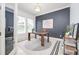 Stylish home office with ample natural light and modern decor at 3227 Watermark Dr, Wesley Chapel, FL 33544