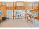 Open-concept living space connecting kitchen and dining areas with wood accents at 3316 W Napoleon Ave, Tampa, FL 33611