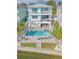 Aerial view of a two-story home with a backyard pool and waterfront access at 371 12Th Ave, Indian Rocks Beach, FL 33785