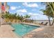 Backyard features a beautiful pool with Gulf access and a boat dock at 371 12Th Ave, Indian Rocks Beach, FL 33785