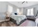 Cozy bedroom with a plush bed, soft lighting, and a comfortable seating area, creating a relaxing retreat at 371 12Th Ave, Indian Rocks Beach, FL 33785