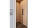 Modern home elevator featuring light wood paneling and a sleek control panel at 371 12Th Ave, Indian Rocks Beach, FL 33785
