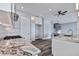 Bright kitchen showcasing stainless steel appliances, marble countertops, wooden flooring and an open floor plan at 371 12Th Ave, Indian Rocks Beach, FL 33785