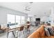 Open floor plan featuring living room, dining space, hardwood floors and water views at 371 12Th Ave, Indian Rocks Beach, FL 33785