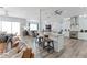Open concept living and kitchen space perfect for entertaining with stone island at 371 12Th Ave, Indian Rocks Beach, FL 33785