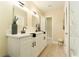 Bright bathroom with double sink vanity, modern fixtures, and stylish decor at 4323 Culbreath Rd # B, Valrico, FL 33596