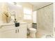 Bright bathroom with white vanity, modern fixtures, walk-in shower with decorative tile and shower curtain at 4323 Culbreath Rd # B, Valrico, FL 33596
