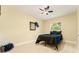 Bedroom featuring modern ceiling fan, a picture window, and ample space at 4323 Culbreath Rd # B, Valrico, FL 33596