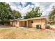 Home showcasing a covered carport, freshly painted exterior, and a well-maintained outdoor space at 4323 Culbreath Rd # B, Valrico, FL 33596