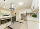 Sleek kitchen with stainless steel appliances, a kitchen island, and bright white cabinetry at 4323 Culbreath Rd # B, Valrico, FL 33596
