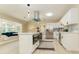 Modern kitchen features a spacious island, stainless appliances, and a charming window nook at 4323 Culbreath Rd # B, Valrico, FL 33596