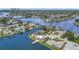 Aerial view showcasing waterfront neighborhood and canal access at 4331 13Th Ne Way, St Petersburg, FL 33703