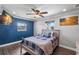 Bedroom featuring hardwood floors, a ceiling fan, and natural light at 4331 13Th Ne Way, St Petersburg, FL 33703