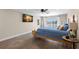 Relaxing main bedroom with wood floors, water views, and ample natural light, creating a peaceful retreat at 4331 13Th Ne Way, St Petersburg, FL 33703