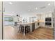 Open kitchen featuring bar seating, stainless steel appliances, and waterway views at 4331 13Th Ne Way, St Petersburg, FL 33703
