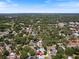 Aerial view of neighborhood with lush trees and view of the property location at 460 4Th S St, Safety Harbor, FL 34695