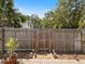Backyard features a privacy fence and a gate at 460 4Th S St, Safety Harbor, FL 34695