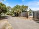 Backyard features a privacy fence and a gate at 460 4Th S St, Safety Harbor, FL 34695
