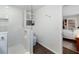 Contemporary bathroom features a shower with built-in shelves and an adjacent toilet at 460 4Th S St, Safety Harbor, FL 34695