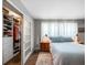 Comfortable bedroom with closet, natural light from window, and a calming ambiance at 460 4Th S St, Safety Harbor, FL 34695