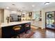 Spacious kitchen featuring a central island, modern appliances, and ample counter space for cooking and entertaining at 460 4Th S St, Safety Harbor, FL 34695