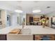 A view of the sink and island that opens to the living room in the home at 460 4Th S St, Safety Harbor, FL 34695