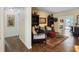 Living room with hardwood floors, decor bookshelves and comfortable seating at 460 4Th S St, Safety Harbor, FL 34695