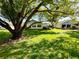 Spacious backyard offering ample green space and scenic surroundings at 4740 Carrington Ct # 4740, New Port Richey, FL 34655
