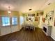 A dining area next to a living area enhances the home's open concept design at 4740 Carrington Ct # 4740, New Port Richey, FL 34655