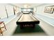 Game room featuring a billiard table, chairs, and neutral decor at 4740 Carrington Ct # 4740, New Port Richey, FL 34655